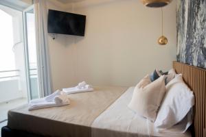 Letto o letti in una camera di Hotel Ficocella