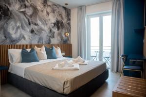 Letto o letti in una camera di Hotel Ficocella