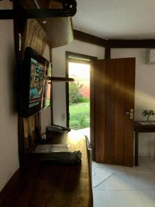 TV a/nebo společenská místnost v ubytování Arraial Praia Hotel Pousada + 47 fotografií