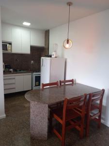 Kuchyň nebo kuchyňský kout v ubytování Hotel Flat Atlântico
