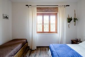Postel nebo postele na pokoji v ubytování Maremmano BnB