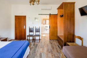 Postel nebo postele na pokoji v ubytování Maremmano BnB