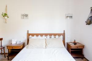 Postel nebo postele na pokoji v ubytování Maremmano BnB