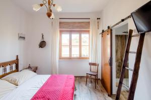 Postel nebo postele na pokoji v ubytování Maremmano BnB