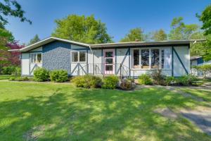 a home with a large yard at Home Rental on Detroit Lake Dock, Game Room! in Detroit Lakes