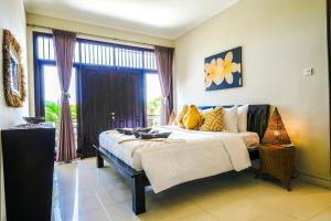 Lova arba lovos apgyvendinimo įstaigoje Villa LOGAN - KUTA - 5 Bedroom - 3 Bathroom Villa - Great Location