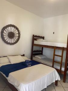 Cama ou camas em um quarto em Pousada Pedra Furada