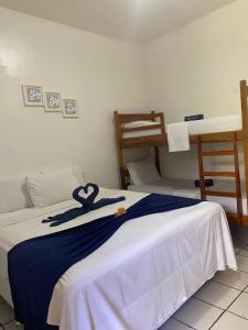 Cama ou camas em um quarto em Pousada Pedra Furada