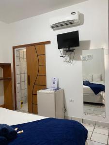 Cama ou camas em um quarto em Pousada Pedra Furada