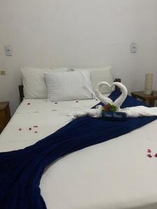 Cama ou camas em um quarto em Pousada Pedra Furada