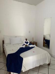 Cama ou camas em um quarto em Pousada Pedra Furada