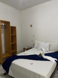 Cama ou camas em um quarto em Pousada Pedra Furada