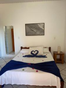 Cama ou camas em um quarto em Pousada Pedra Furada