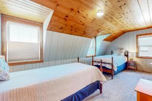 Ένα ή περισσότερα κρεβάτια σε δωμάτιο στο Seaside Retreat