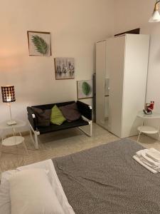 Posteľ alebo postele v izbe v ubytovaní 4 Season B&B Roma