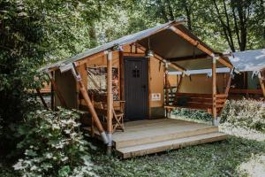 a gazebo with a porch and a deck at Sioglamping in Siocamping in Siófok