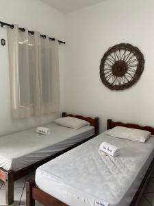 Cama ou camas em um quarto em Pousada Pedra Furada