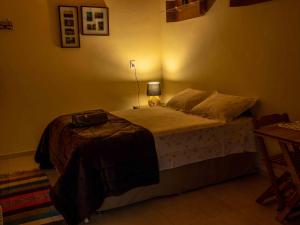 Katil atau katil-katil dalam bilik di Pousada & Glamping Terra de Aquários