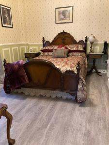 a bedroom with a large bed in a room at South Haven in Aylesford