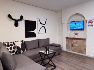 TV a/nebo společenská místnost v ubytování Casa Estadio