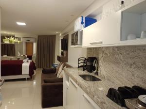 Kjøkken eller kjøkkenkrok på Nomar X - Lindo Apartamento à 50MTS mar