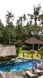 The swimming pool at or close to Secret Moon Beach House