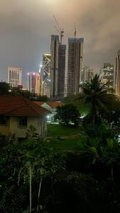 a view of a city skyline with tall buildings at Embassy Home KLCC Jalan Ampang in Kuala Lumpur