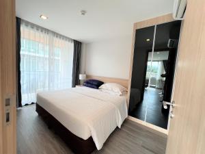 Postel nebo postele na pokoji v ubytování 1 bed Corner apartment in Kata - Grand Kata VIP + 25 fotografií