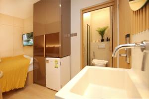 TV a/nebo společenská místnost v ubytování Coliwoo Orchard - CoLiving