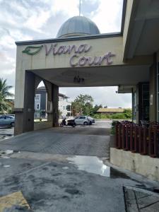 a venna court sign in front of a parking lot at Risqi Apartment 1 Bedroom Wakaf Che Yeh in Wakaf Che Yeh