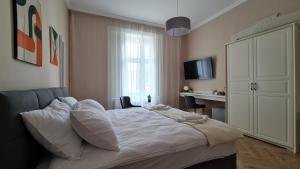 Postel nebo postele na pokoji v ubytování Urban Haven