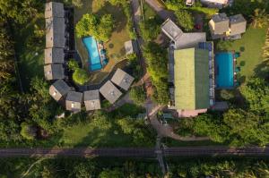 an overhead view of a house with a pool at The South Lake - Ahangama in Koggala