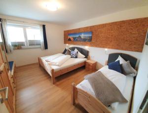 Posteľ alebo postele v izbe v ubytovaní Ferienwohnung Glockenblume