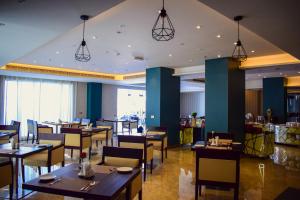 Restaurace v ubytování The Secure Inn Hotel Muscat
