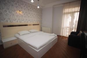 Ένα ή περισσότερα κρεβάτια σε δωμάτιο στο Hotel Irise