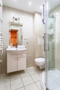 Kúpeľňa v ubytovaní ZAKOHOME- Apartamenty Kościelisko Centrum