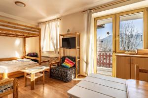 Posteľ alebo postele v izbe v ubytovaní ZAKOHOME- Apartamenty Kościelisko Centrum