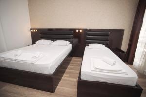 Postel nebo postele na pokoji v ubytování Hotel Irise