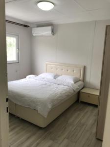 Postel nebo postele na pokoji v ubytování SEYRİ DENİZ VİLLA Villa with sea view