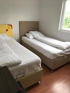 Postel nebo postele na pokoji v ubytování SEYRİ DENİZ VİLLA Villa with sea view