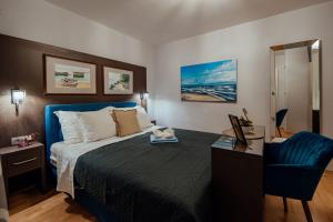 Posteľ alebo postele v izbe v ubytovaní Guesthouse Villa Diana