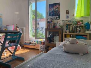 Ένα ή περισσότερα κρεβάτια σε δωμάτιο στο Full equiped house with garden