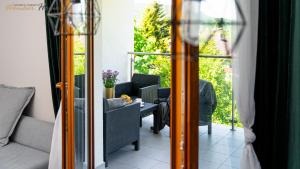 Posedenie v ubytovaní Wonder Home - Apartamenty z balkonami, blisko centrum Karpacza, stoku i aquaparku