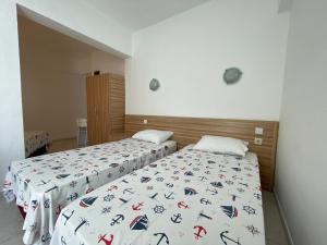 Postel nebo postele na pokoji v ubytování Hotel Status
