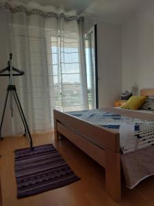 Postel nebo postele na pokoji v ubytování Apartment Dario