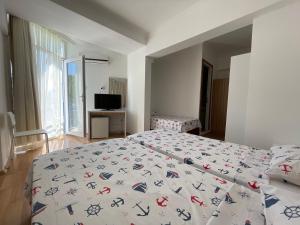 Postel nebo postele na pokoji v ubytování Hotel Status