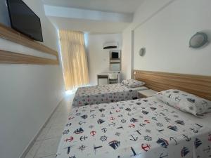 Postel nebo postele na pokoji v ubytování Hotel Status