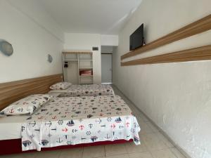 Postel nebo postele na pokoji v ubytování Hotel Status