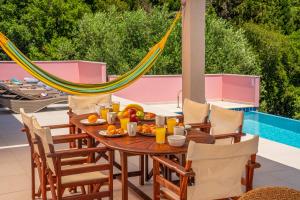 The swimming pool at or close to Villa Helios Sea View & Private Pool near Fiskardo