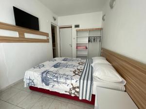 Postel nebo postele na pokoji v ubytování Hotel Status